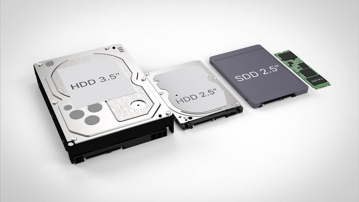 A comparison of different storage drives: a 3.5-inch HDD, a 2.5-inch HDD, a 2.5-inch SSD, and an M.2 NVMe SSD, showcasing their size differences and form factors.