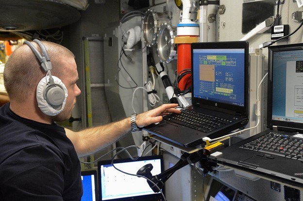 nasa scientist on a computer