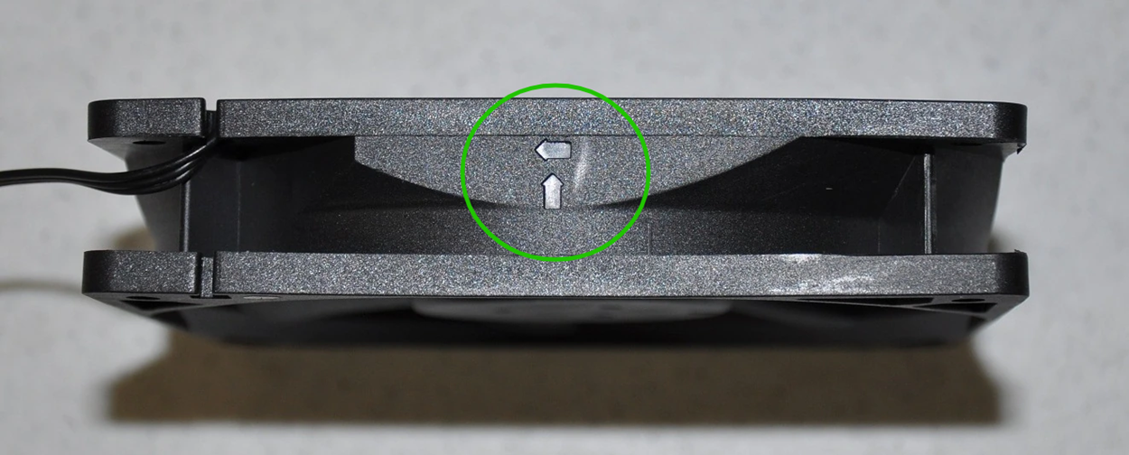 What do the arrows mean on a case fan?