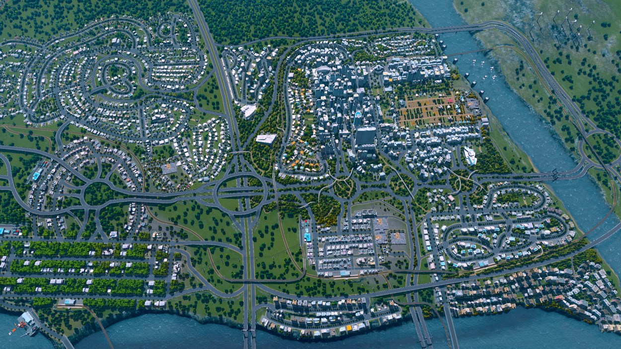 Cities Skyline screenshot over top of city - casual gamer